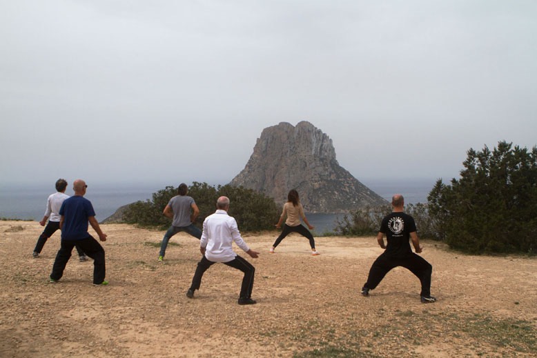 TheFeel ZenmaX Baduanjin qigong exercise, lifting the heavy mountain at Es Vedra Ibiza SpaIN